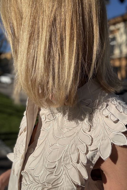 Noen bluse uten arm